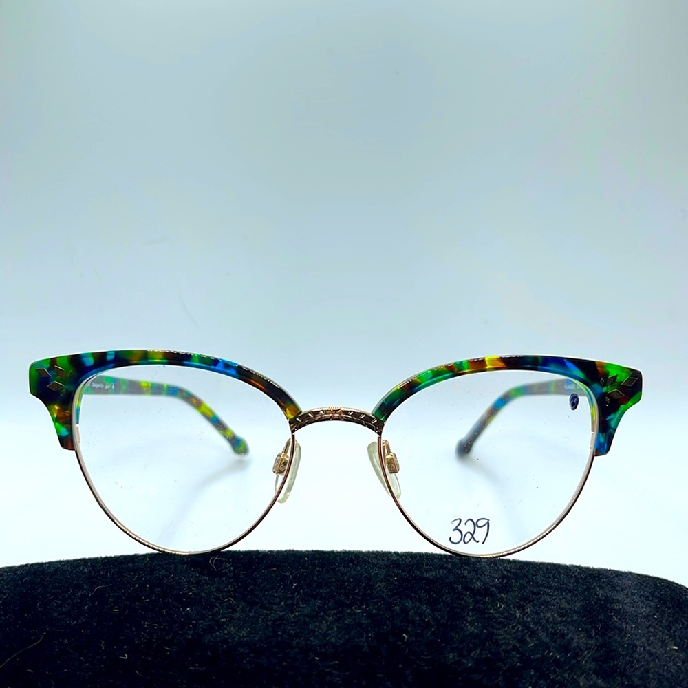 NWOT. Faniel Optical frames. Blue, green, yellow, and brown with gold accents.